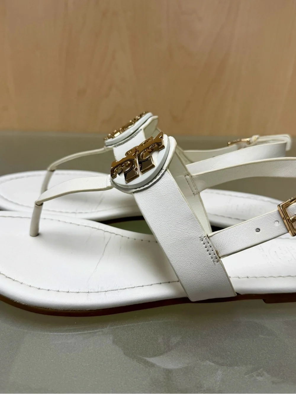 Tory Burch Bryce White Leather Thong Sandals with Gold Emblem